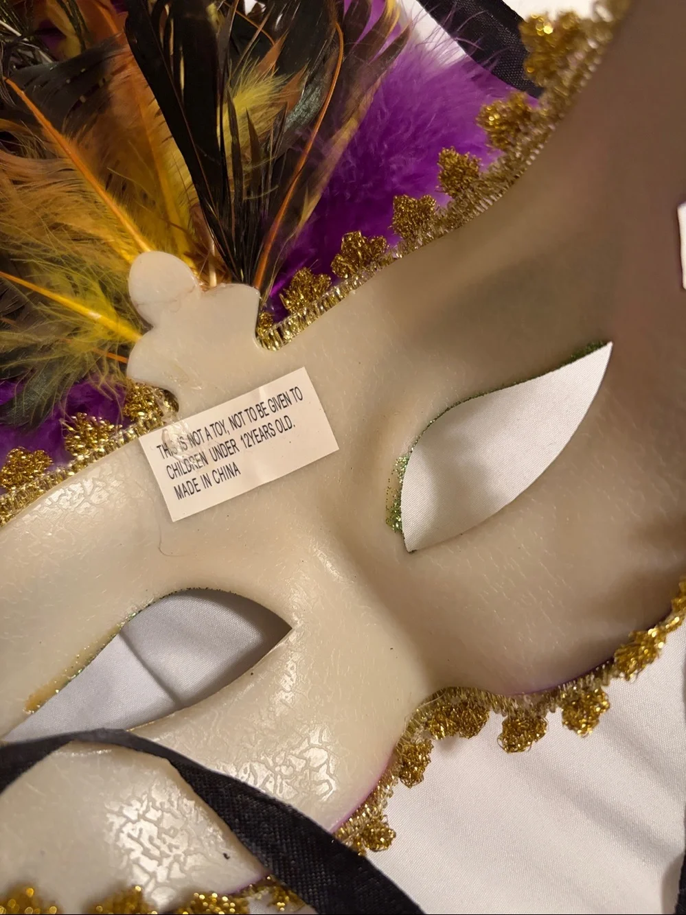 Feathered Purple & Gold Mardi Gras Mask with Green Glitter Accents